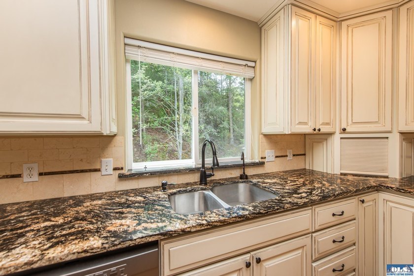 This beautifully appointed home offers water views, thoughtful - photo 21