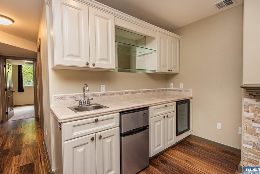 This beautifully appointed home offers water views, thoughtful - photo 36