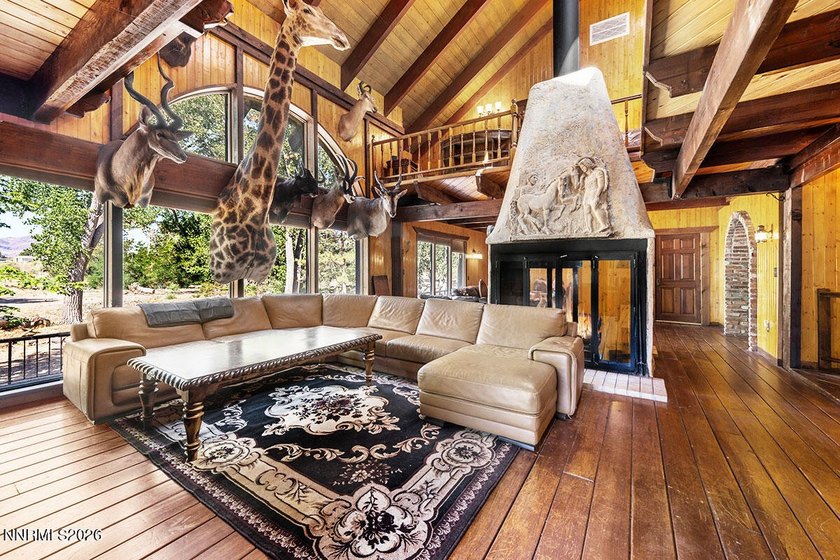 Discover a truly rare Nevada riverfront retreat - a majestic - photo 2