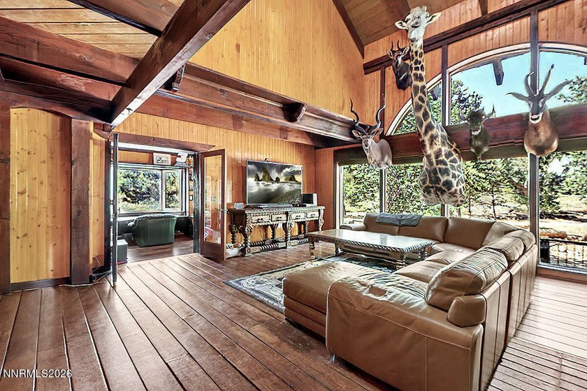 Discover a truly rare Nevada riverfront retreat - a majestic - photo 3