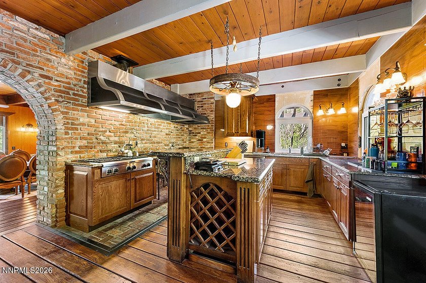 Discover a truly rare Nevada riverfront retreat - a majestic - photo 9