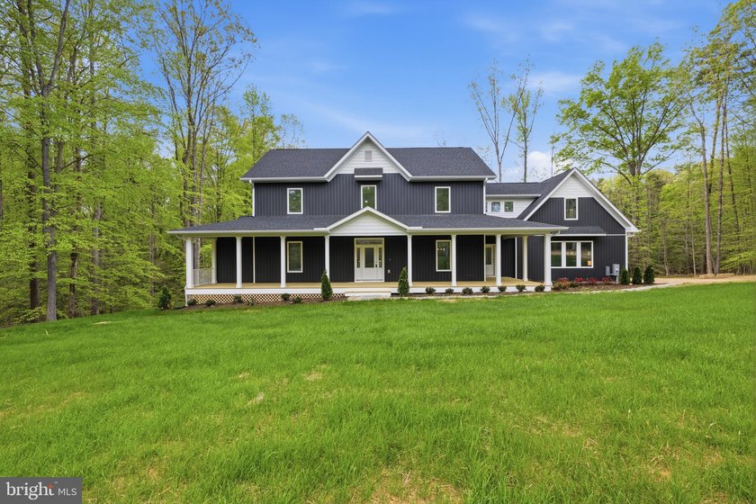 **Listed nearly $50k under appraised value!** This stunning - photo 5