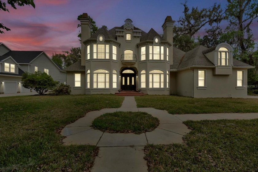 Tucked away in the prestigious Sugar Mill Plantation, this - photo 4