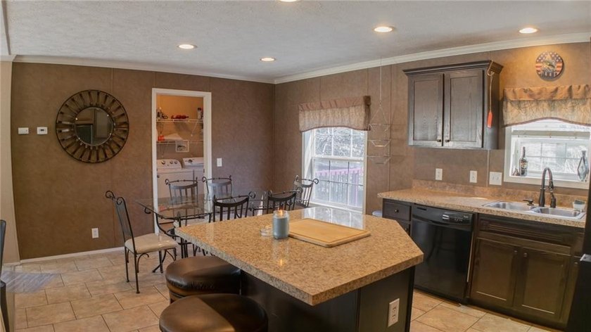 This charming 1,350 sq ft manufactured home sits on a permanent - photo 9