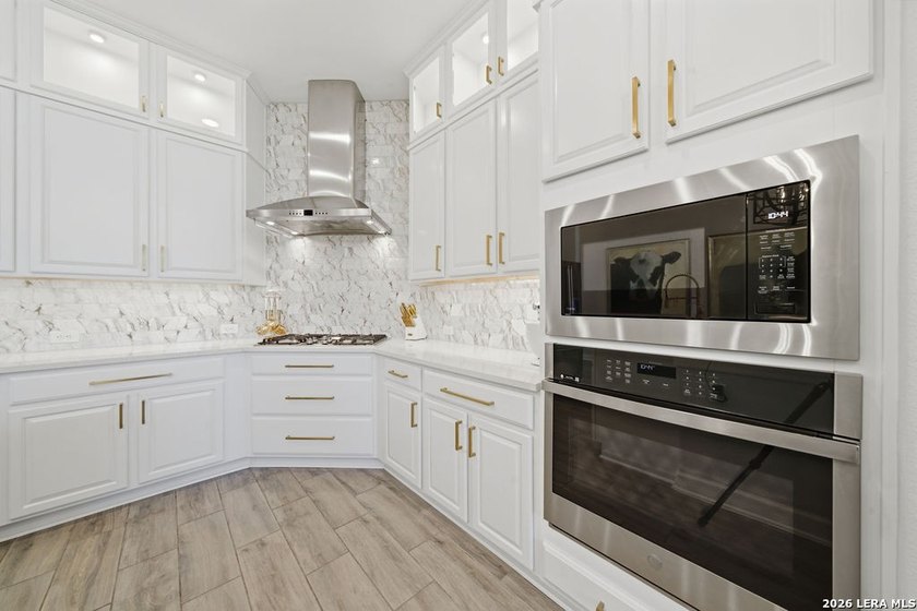 LUXURY UPGRADES! Welcome to this stunning one-story home where - photo 11