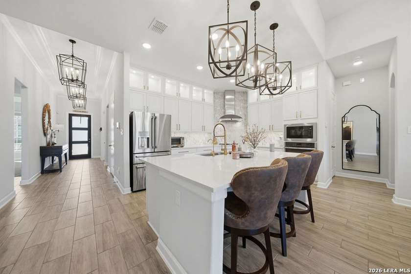 LUXURY UPGRADES! Welcome to this stunning one-story home where - photo 12