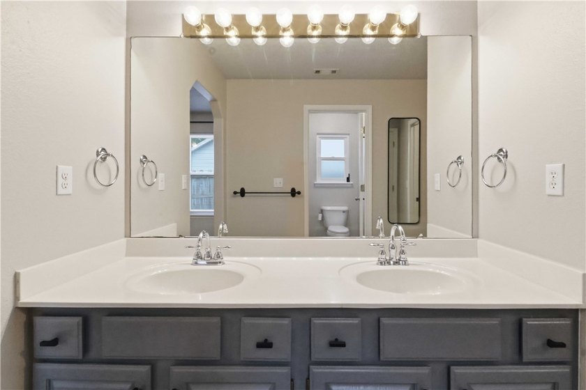 Welcome to this well-maintained 3-bedroom, 2-bath home in a - photo 17