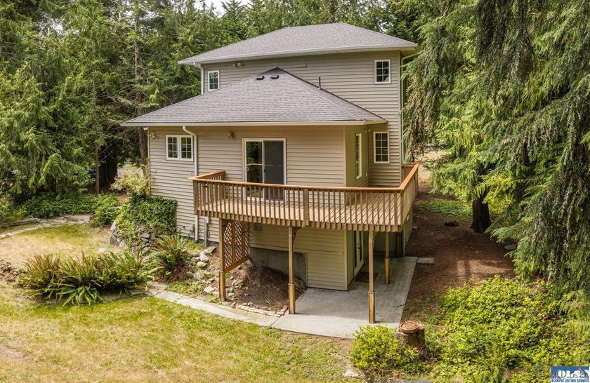 Amongst the trees on an acre this lovely 4 bed 2.5 bath home is - photo 17