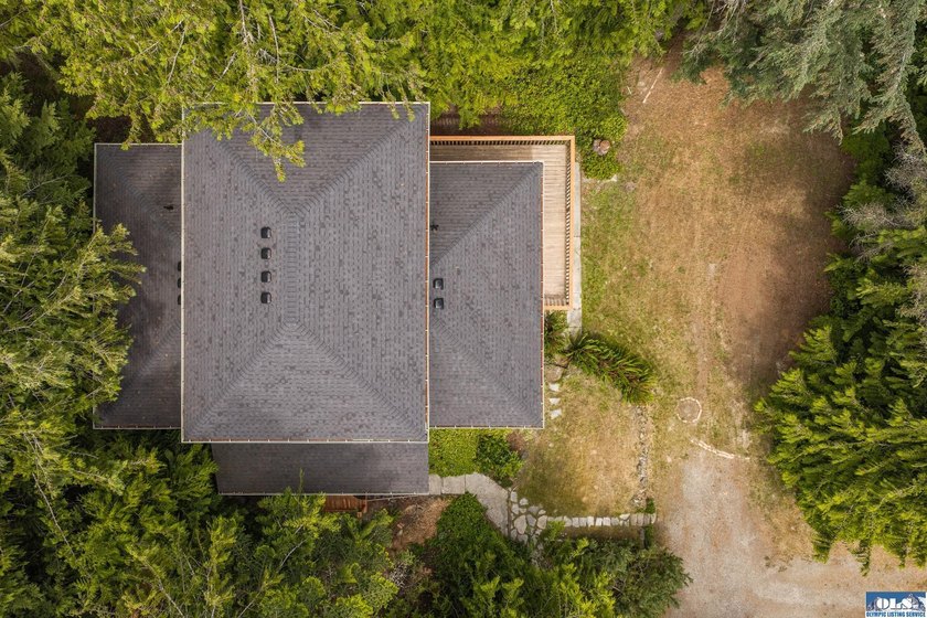 Amongst the trees on an acre this lovely 4 bed 2.5 bath home is - photo 19