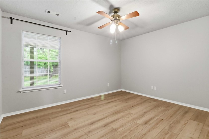Welcome to this well-maintained 3-bedroom, 2-bath home in a - photo 21