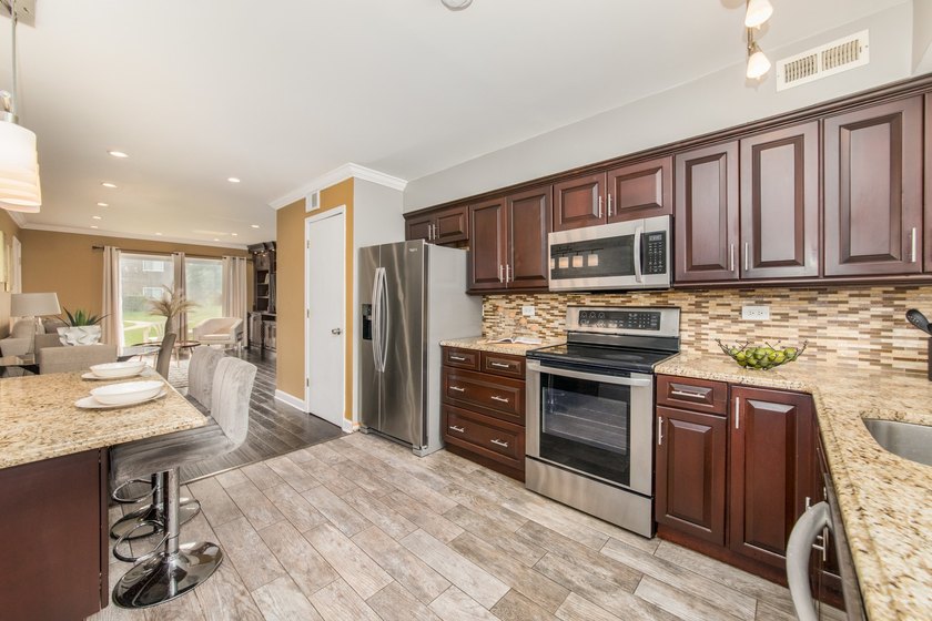 Exceptional first-floor 2-bedroom, 1-bath condo offering one of - photo 5