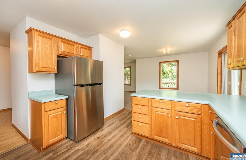 Amongst the trees on an acre this lovely 4 bed 2.5 bath home is - photo 28