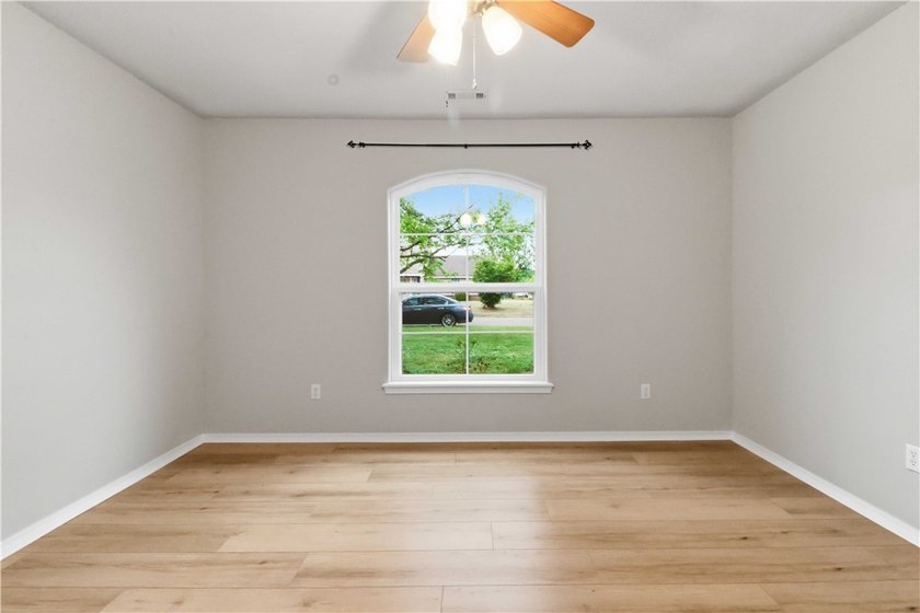 Welcome to this well-maintained 3-bedroom, 2-bath home in a - photo 29