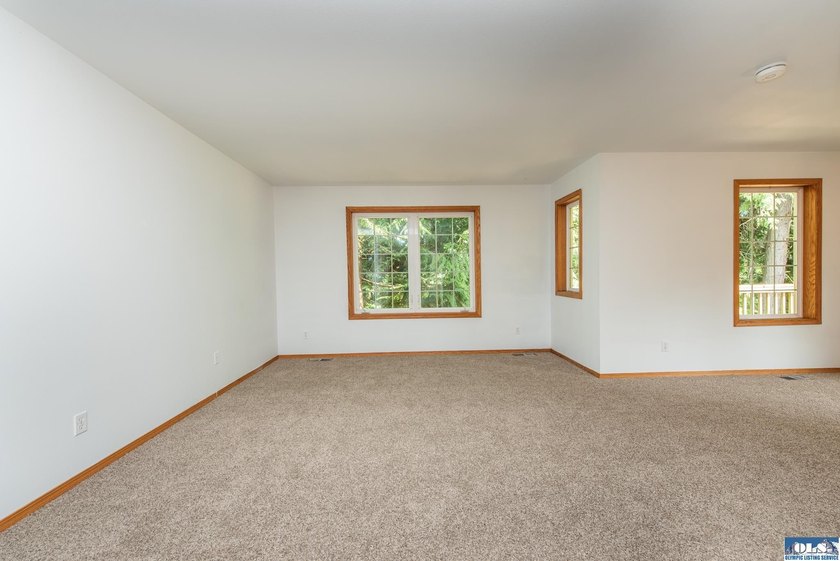 Amongst the trees on an acre this lovely 4 bed 2.5 bath home is - photo 33