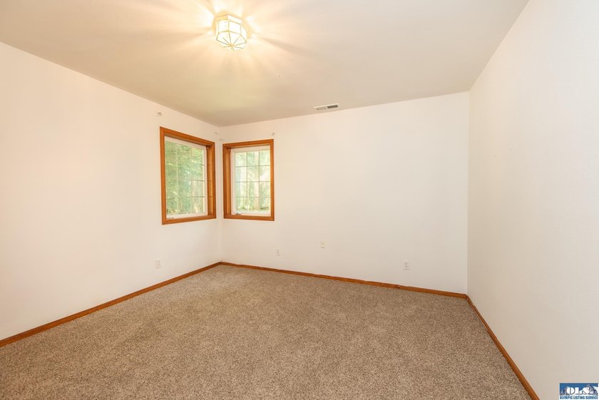 Amongst the trees on an acre this lovely 4 bed 2.5 bath home is - photo 43