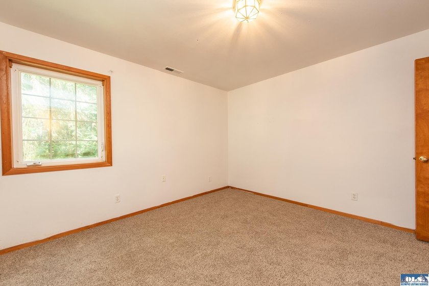 Amongst the trees on an acre this lovely 4 bed 2.5 bath home is - photo 44
