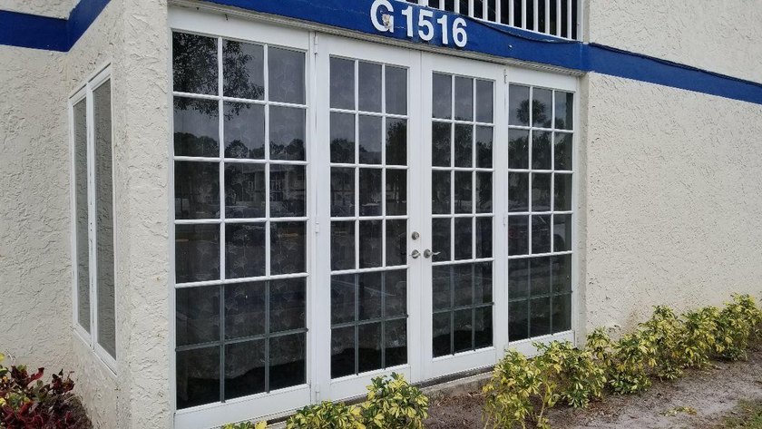 This updated ground floor unit features closed in porch; - photo 19