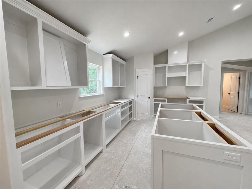 New construction on a wooded 0.65-acre lot in Lakewood Shores at - photo 3