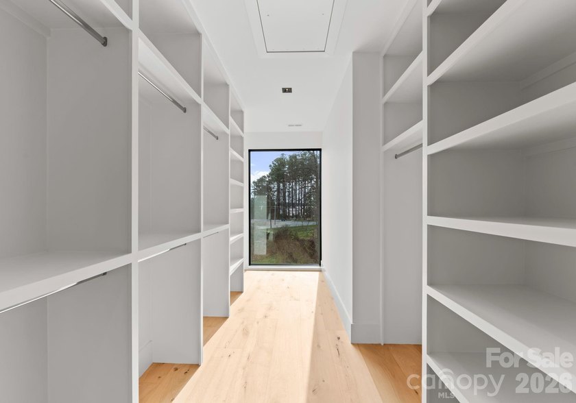 Private by design. Defined by the lake. Behind private gates and - photo 33