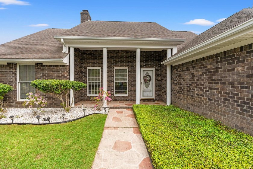 Custom built all-brick home, with a large private pool, on a - photo 5