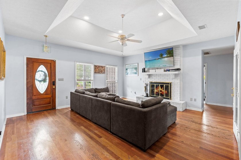 Custom built all-brick home, with a large private pool, on a - photo 7