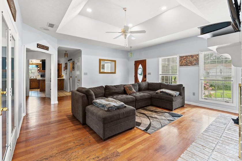 Custom built all-brick home, with a large private pool, on a - photo 8