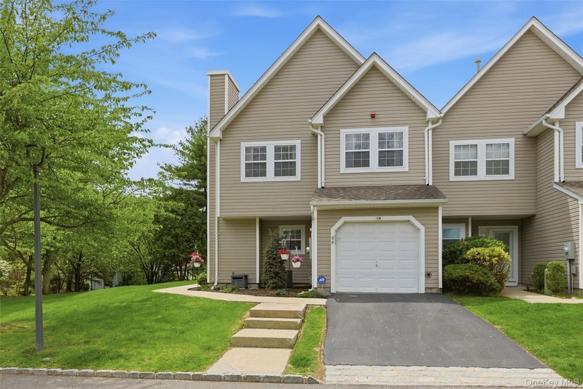 Welcome to 84 Erik Drive, a beautifully updated Devon end unit - photo 2