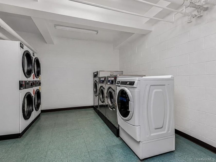 Welcome home to this spacious, bright and updated studio coop - photo 10