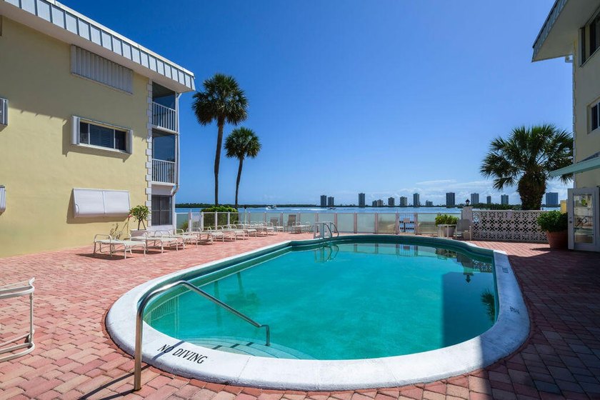 Experience serene waterfront living in this beautifully - photo 11
