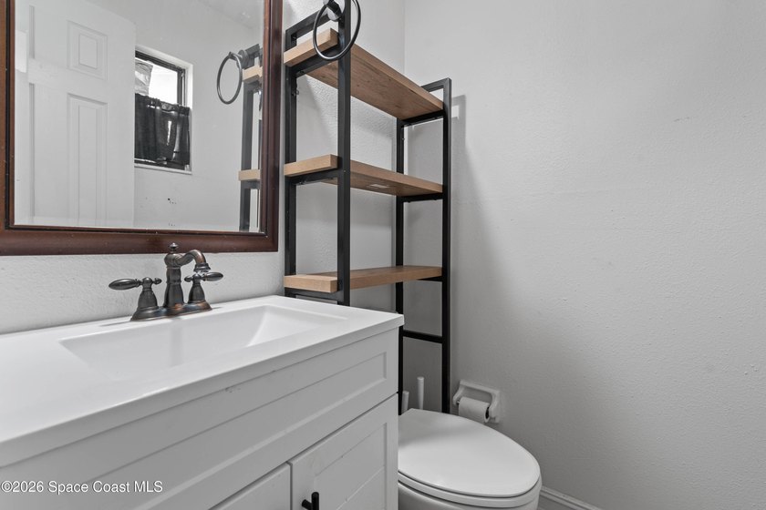 Move-in ready 2-bedroom, 1.5-bath home featuring a beautifully - photo 15