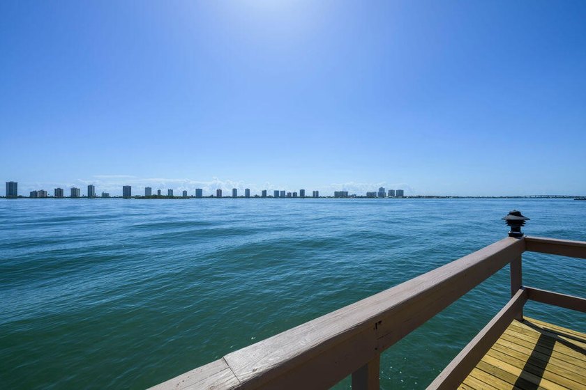 Experience serene waterfront living in this beautifully - photo 33