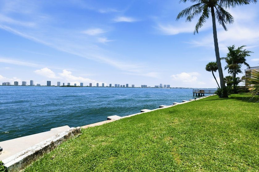 Experience serene waterfront living in this beautifully - photo 35