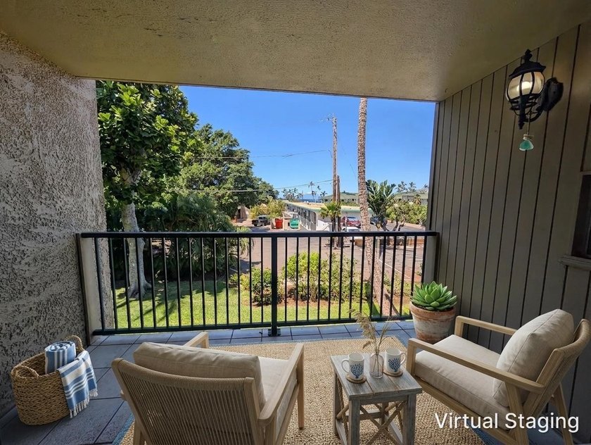 Best front row location in the complex with a partial ocean view - photo 2