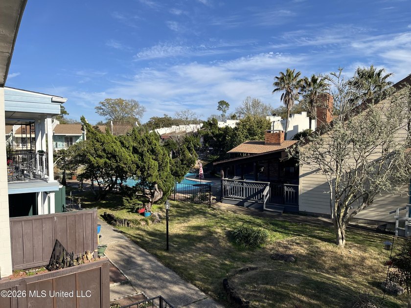 Located within the gated Colony Park Condominium community, this - photo 24
