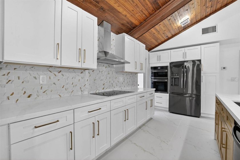 This STUNNING remodeled home is now offered for sale! The home - photo 12