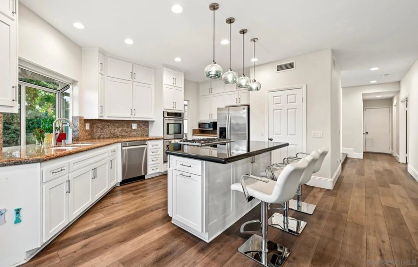 Discover elevated living in this exquisite executive home in the - photo 8