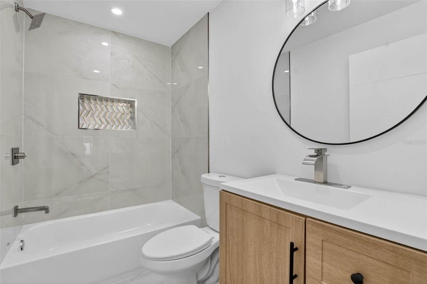 This STUNNING remodeled home is now offered for sale! The home - photo 39