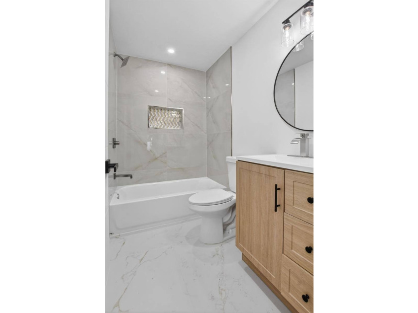 This STUNNING remodeled home is now offered for sale! The home - photo 40