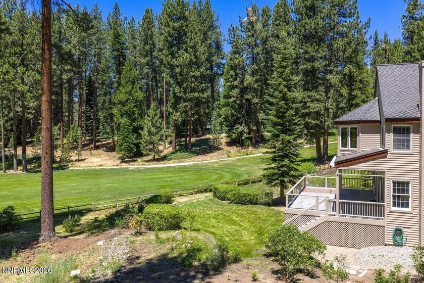 Nestled within the gated, lakefront Glenbrook community on the - photo 4