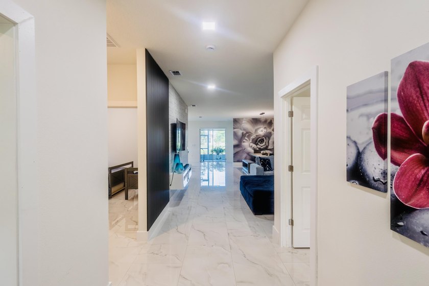 Now $519,900 + $10,000 seller credit! This 2024-built 4-bedroom - photo 6