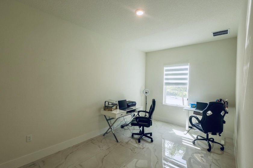 Now $519,900 + $10,000 seller credit! This 2024-built 4-bedroom - photo 7