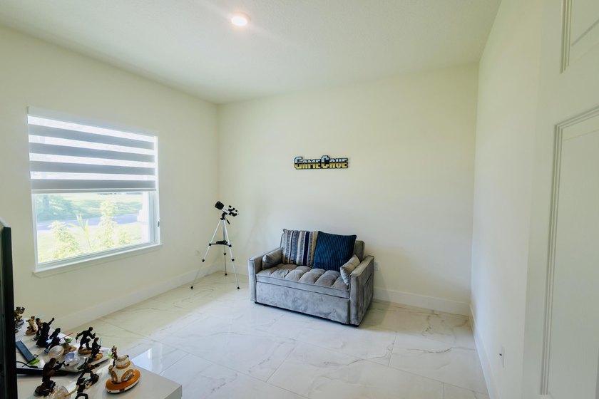 Now $519,900 + $10,000 seller credit! This 2024-built 4-bedroom - photo 8