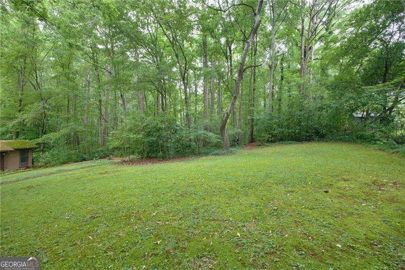 Absolute privacy awaits at this 6.47 acre property located only - photo 10