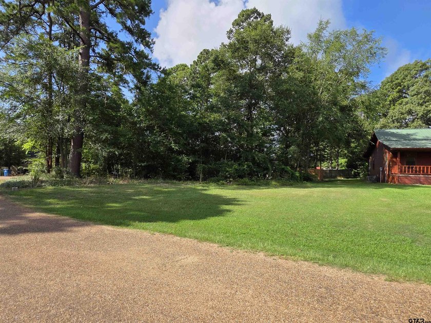 Great water-view home includes two lots, the home and all - photo 2