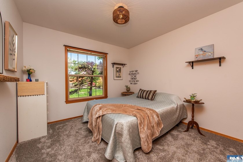 Nestled on a peaceful street in Sequim, this property backs - photo 26