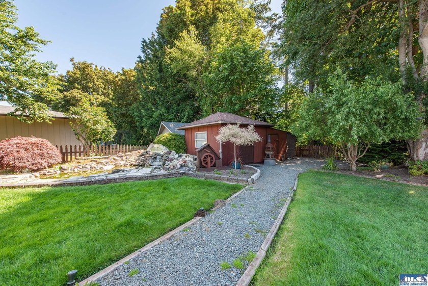 Nestled on a peaceful street in Sequim, this property backs - photo 41