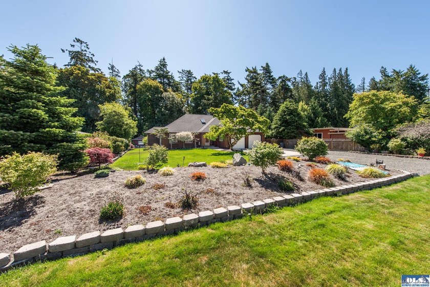 Nestled on a peaceful street in Sequim, this property backs - photo 45