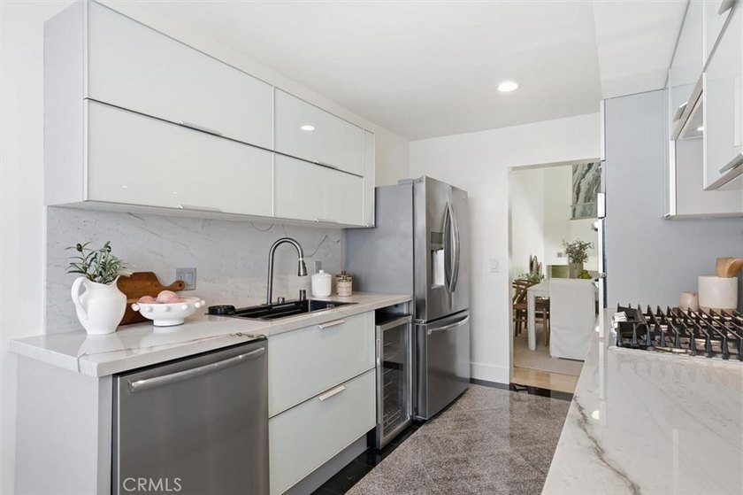 Experience a refined, low-maintenance beach lifestyle at - photo 5