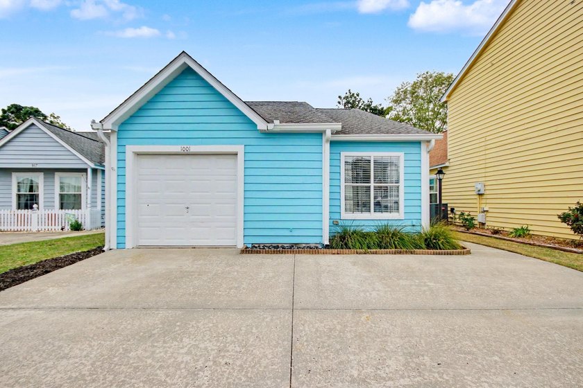 Experience coastal living in a beautifully updated home located - photo 2