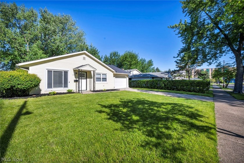 Welcome home to this beautifully updated ranch offering the - photo 2